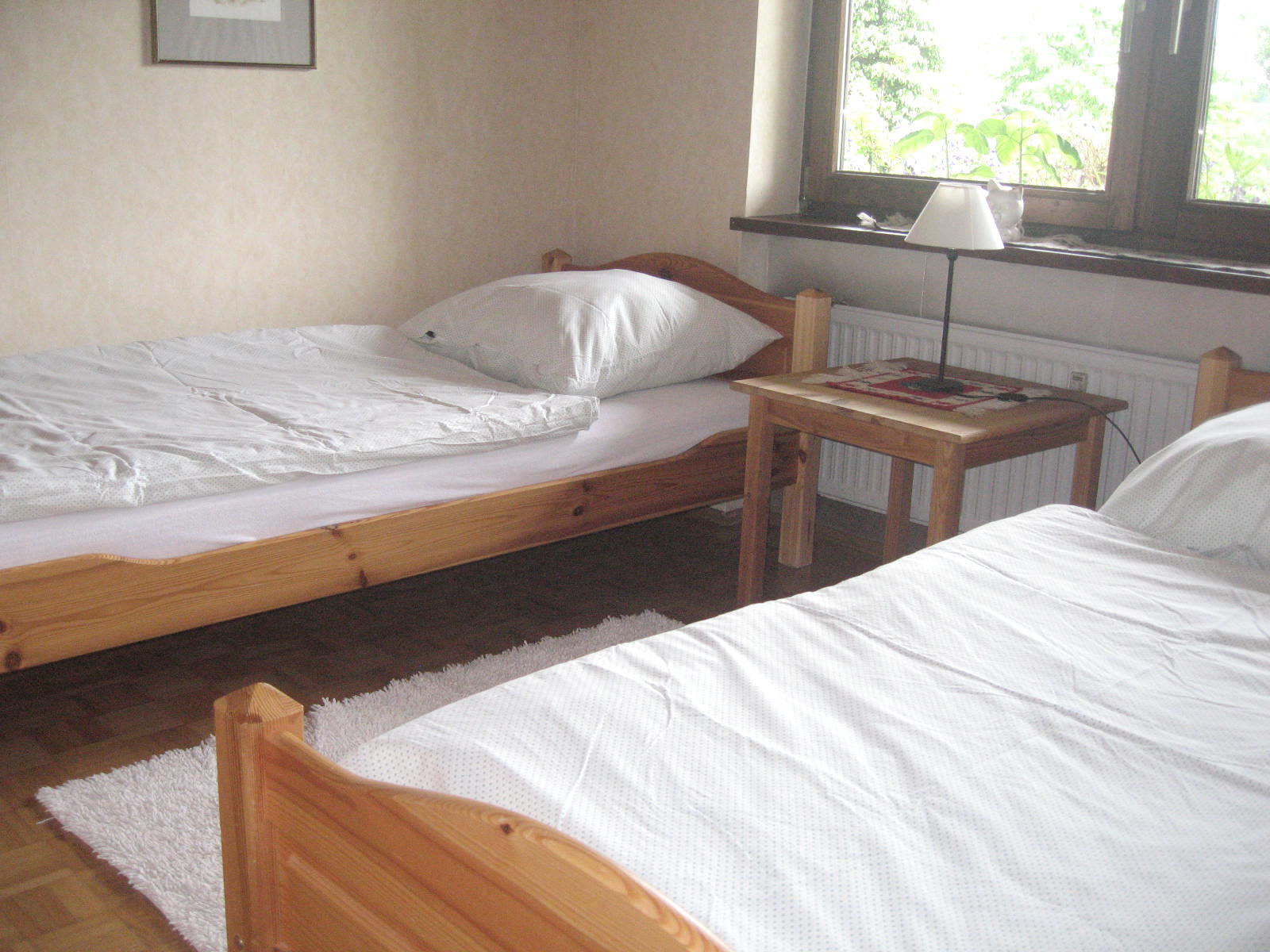 Das bequeme Schlafzimmer unserer Ferienwohnung in Buchen im Odenwald